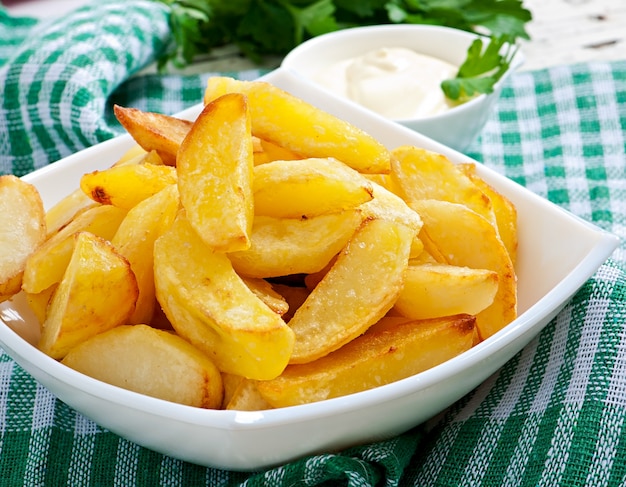 Fried potato wedges