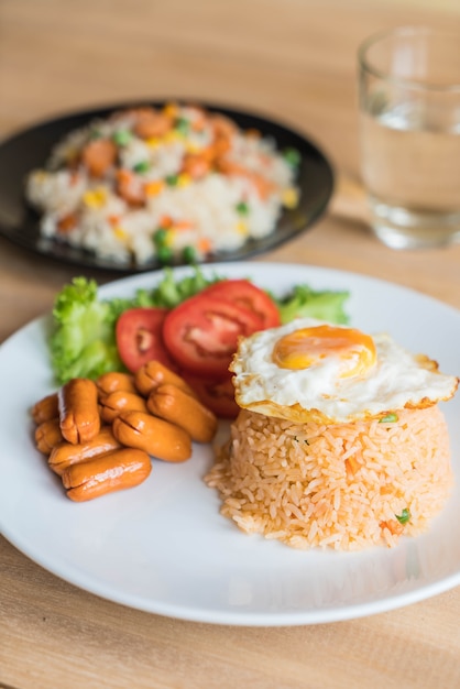 fried rice with sausage and fried egg