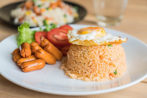 fried rice with sausage and fried egg