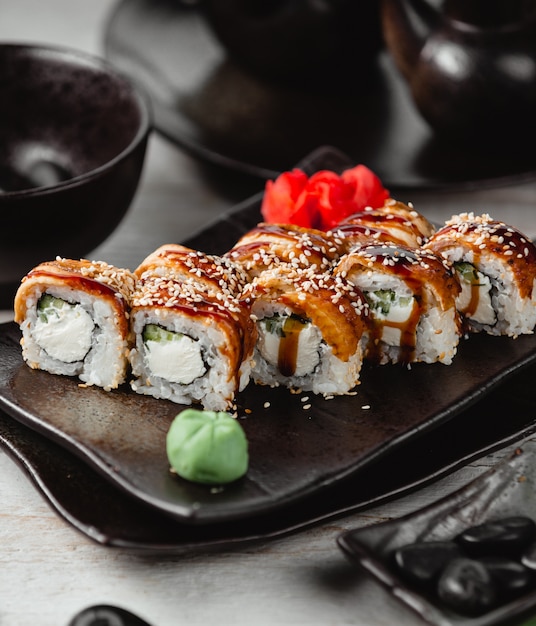 fried sushi with fish rice ginger and wasabi