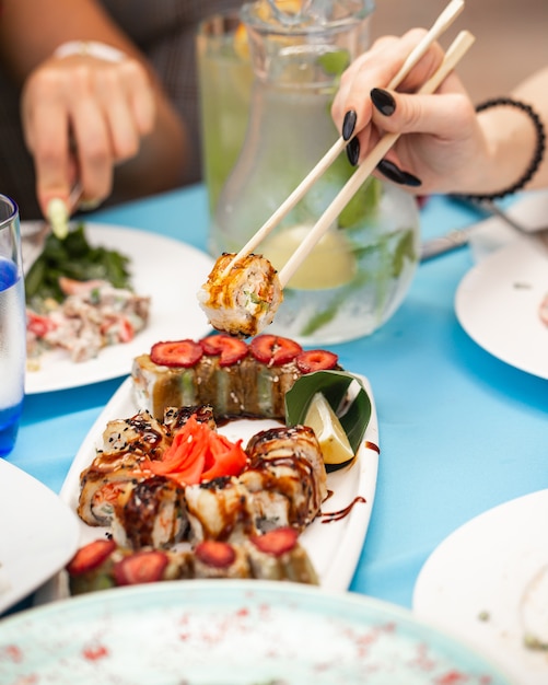 fried sushi with vegetables and ginger