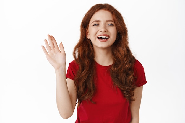 Friendly redhead woman smiling