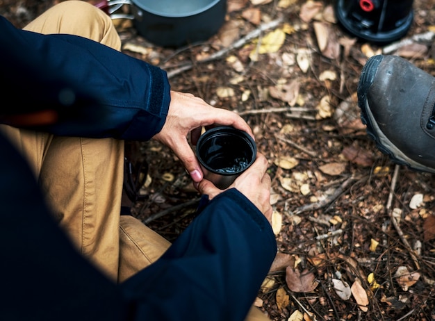 Free photo friends camping in the forest together