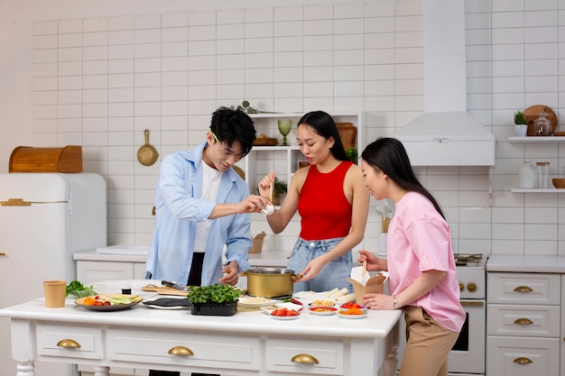 Friends cooking japanese food together