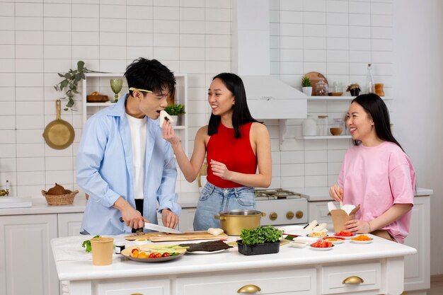 Friends cooking japanese food together