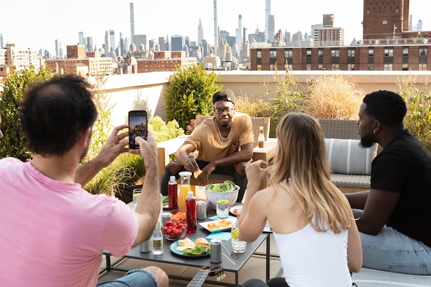 Friends cooking together on a barbecue