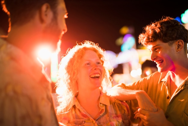 Free photo friends enjoying the night outdoor