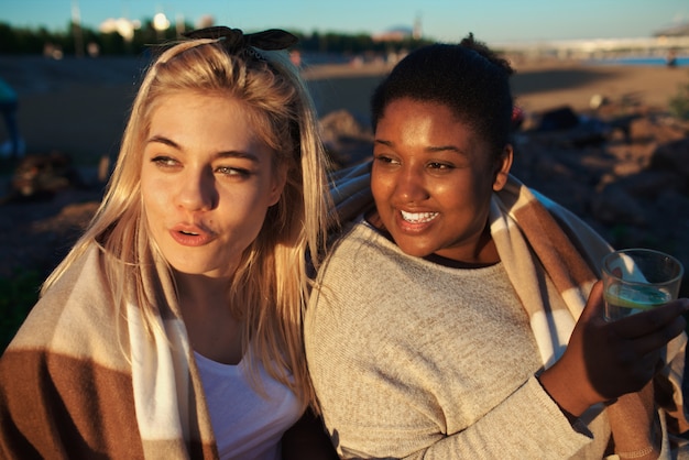 Friends at the evening on the beach