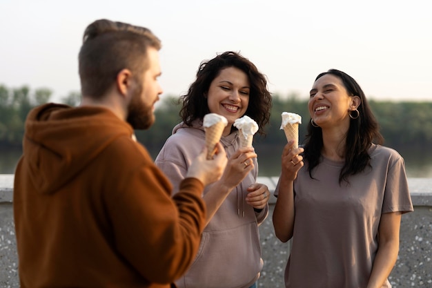 Friends getting some street food outdoors