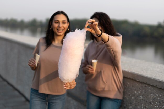 Friends getting some street food outdoors