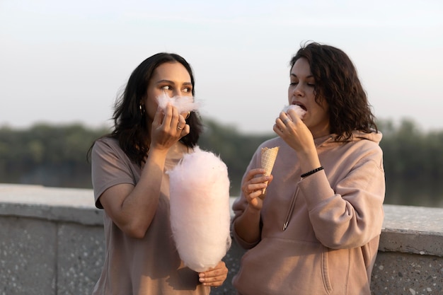 Friends getting some street food outdoors