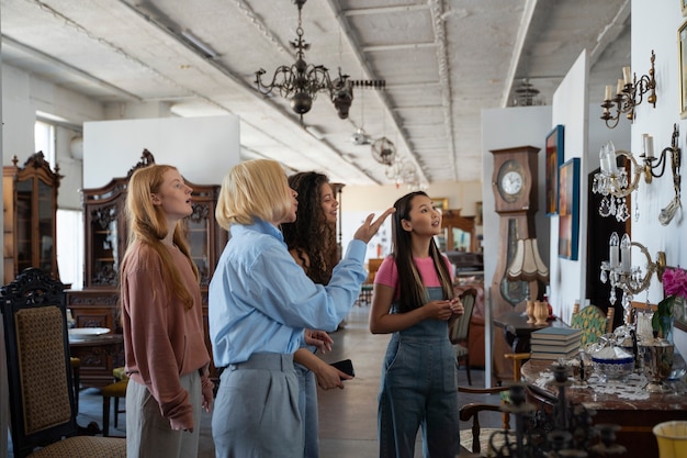 Friends going shopping in antique store