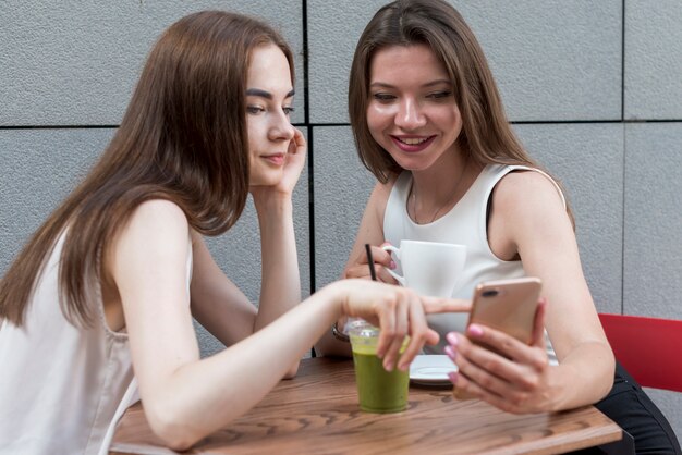 Friends having a coffee together