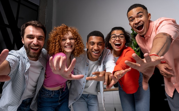 Friends having a crowded party at home