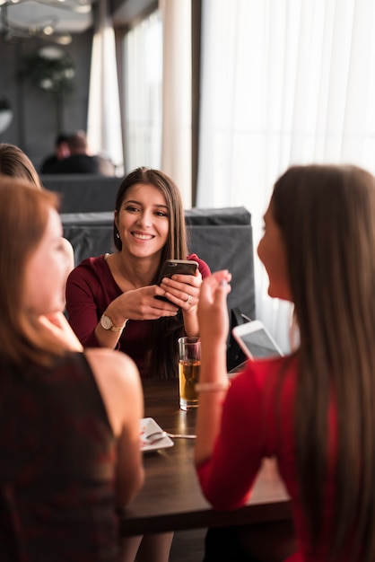 Friends having dinner at a restaurant