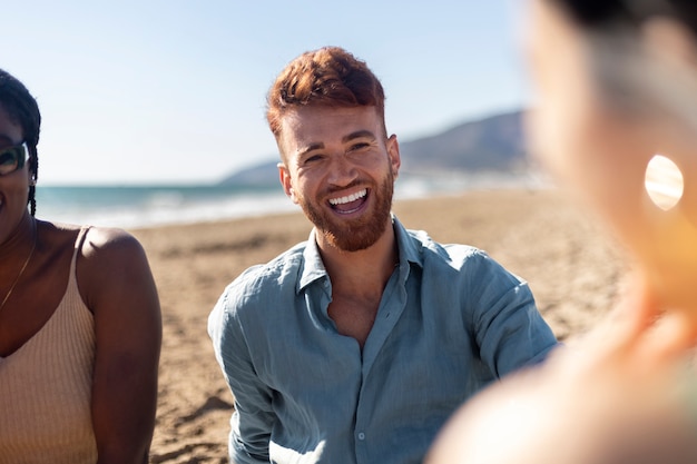 Friends having fun by the sea side