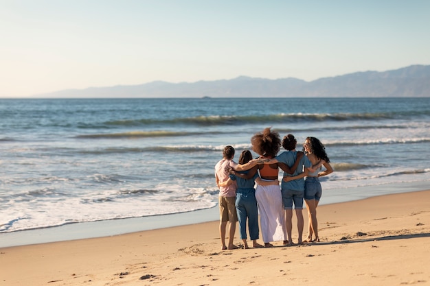 Friends having fun by the seaside