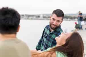 Free photo friends having fun together outdoors