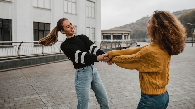 Free photo friends having fun together outdoors