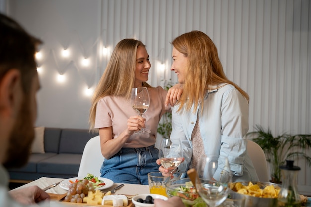 Friends having fun together while cooking