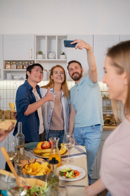 Friends having fun together while cooking