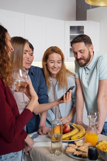 Friends having fun together while cooking