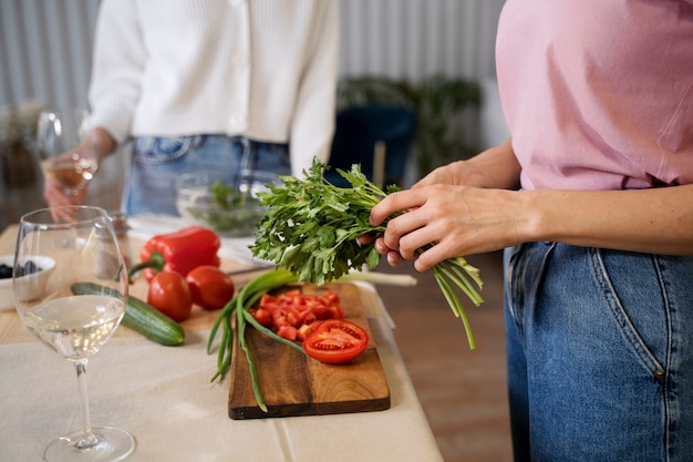 Friends having fun together while cooking