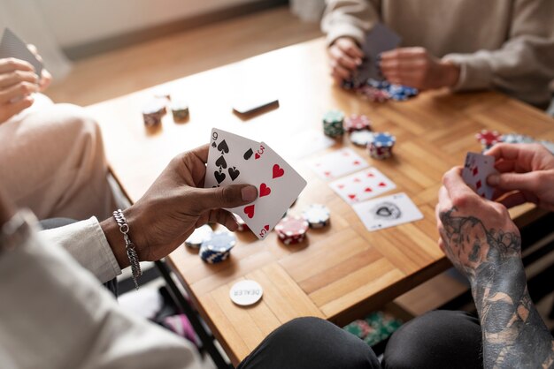 Friends having fun while playing poker