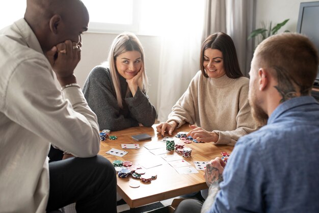 Friends having fun while playing poker