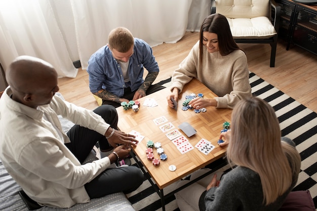 Friends having fun while playing poker