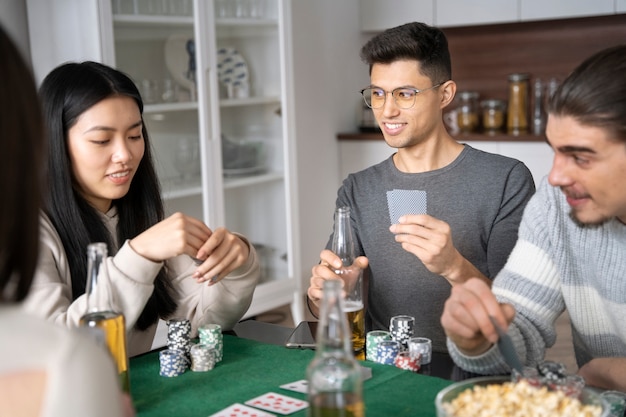 Friends having fun while playing poker