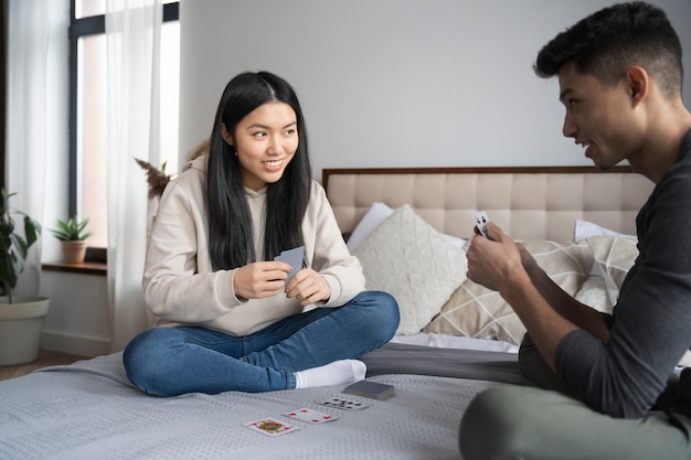 Friends having fun while playing poker