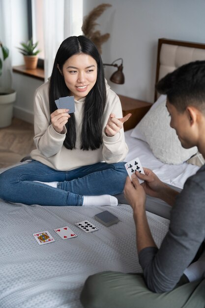 Friends having fun while playing poker