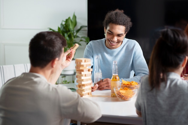 Friends having fun with traditional games