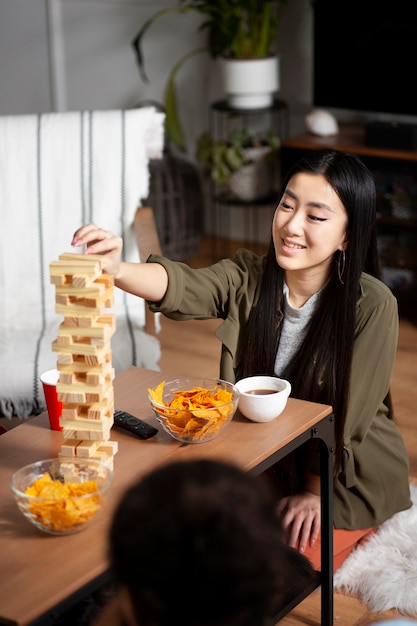 Friends having fun with traditional games