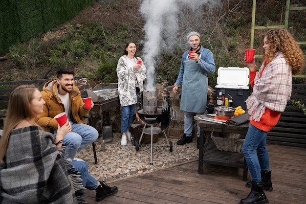 Free photo friends having a nice barbeque together