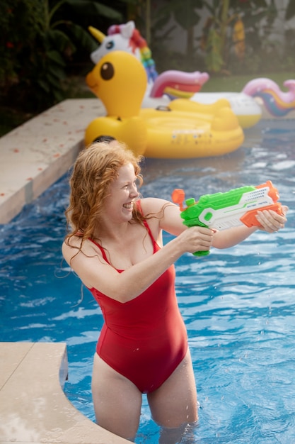 Friends having a party celebration at the pool