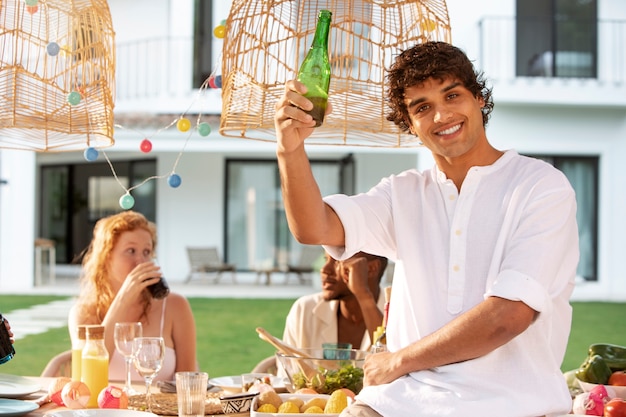 Friends having a party celebration at the pool