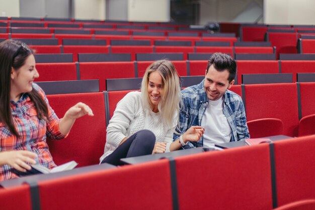 Friends laughing at lecture