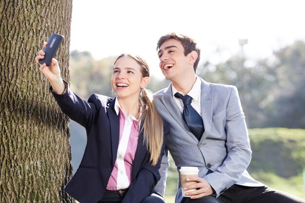 Friends laughing and taking a photo