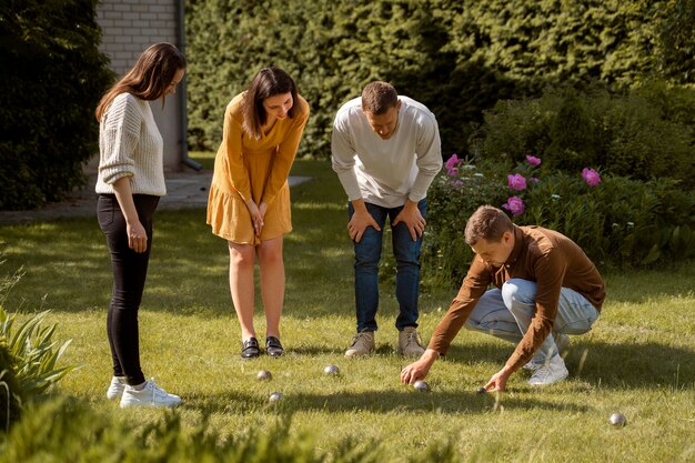 Friends playing sport outside full shot