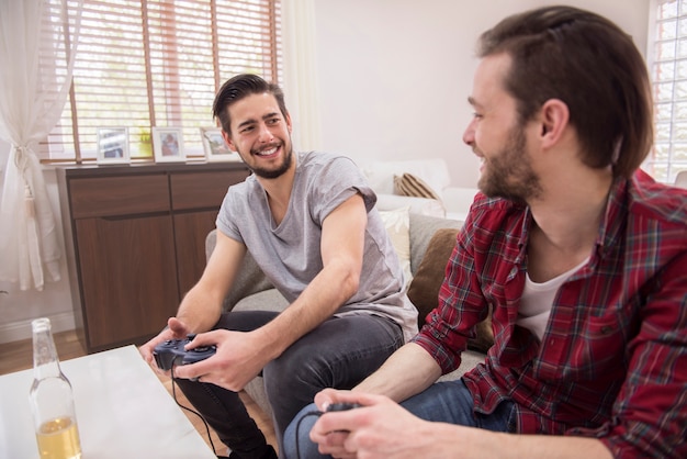 Friends playing videogames