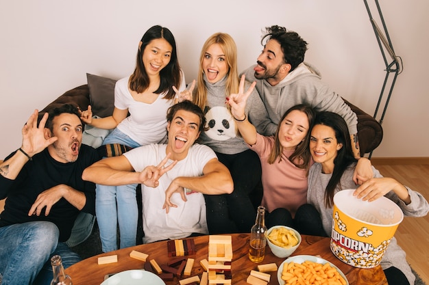 Friends posing with chips