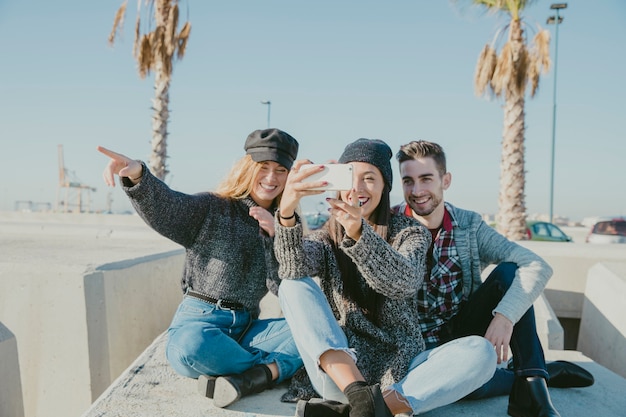 Friends taking selfie