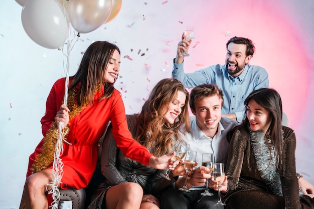 Friends toasting at a new year party