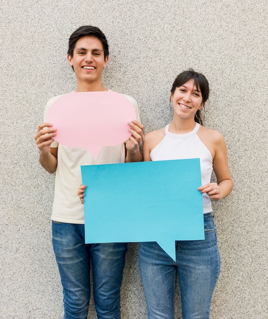 Friends together holding speech bubbles