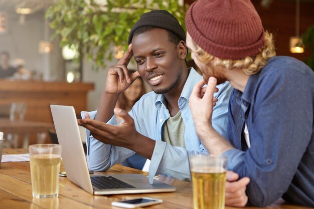 Friends working together at a pub