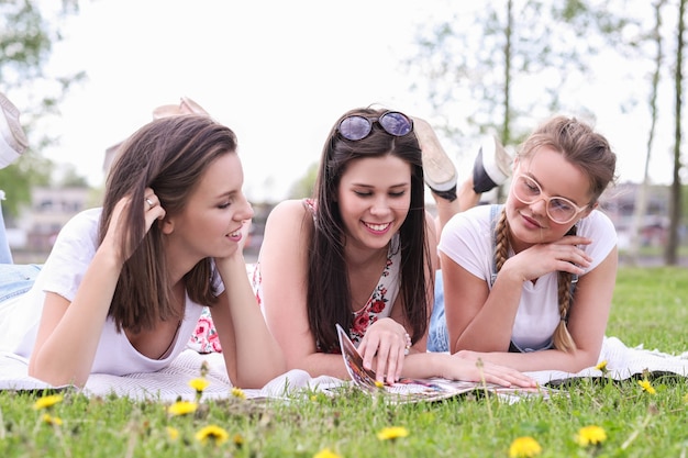 Free photo friendship. women in park during the day