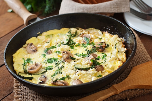 Frittata with mushrooms, zucchini and cheese