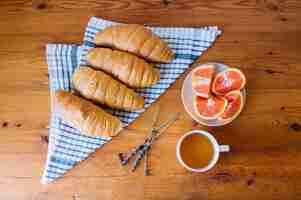 Free photo from above croissants and citrus